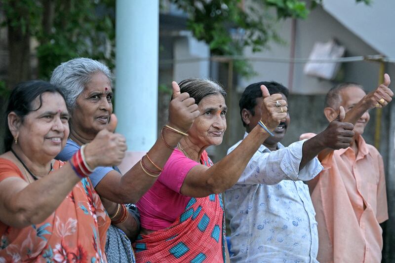 Villagers celebrate the election of Donald Trump inside a temple in Vadluru, the ancestral village of the parents of Usha Vance, wife of vice presidential nominee J.D. Vance, in the West Godavari district in India's Andhra Pradesh state on Nov.  6, 2024.