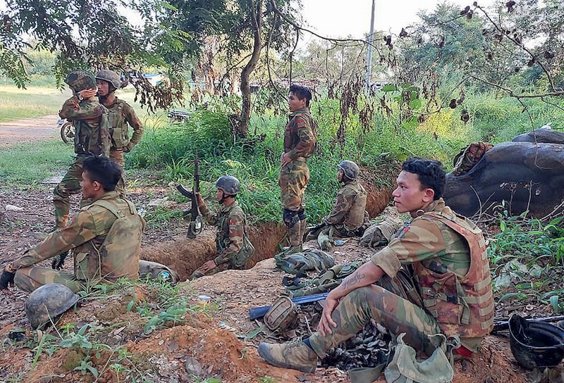 Members of the Ta'ang National Liberation Army (TNLA) gather inside a captured Myanmar military base in Hsipaw on Oct. 15, 2024.