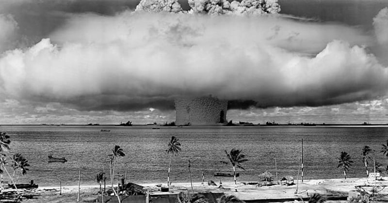 The "Baker" explosion, part of Operation Crossroads, a nuclear weapon test by the United States military at Bikini Atoll, Micronesia, on 25 July 1946. The wider, exterior cloud is actually just a condensation cloud caused by the Wilson chamber effect, and was very brief. There was no classic mushroom cloud rising to the stratosphere, but inside the condensation cloud the top of the water geyser formed a mushroom-like head called the cauliflower, which fell back into the lagoon (compare with this image, a photo taken slightly later, after the condensation cloud had cleared). The water released by the explosion was highly radioactive and contaminated many of the ships that were set up near it. Some were otherwise undamaged and sent to Hunter's Point in San Francisco, California, United States, for decontamination. Those which could not be decontaminated were sunk a number of miles off the coast of San Francisco.