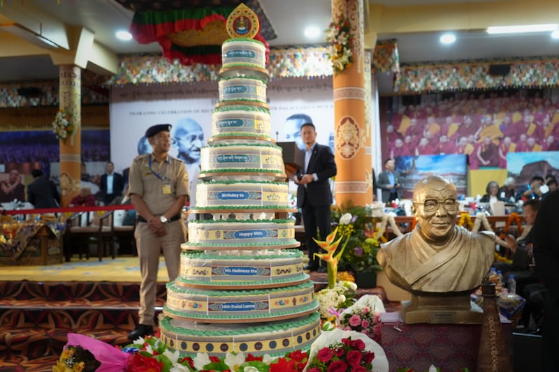 A birthday cake for Tibetan spiritual leader the Dalai Lama and a bust are seen during celebrations on the 90th birthday of the Dalai Lama at the Main Temple in Dharamsala, India, July 6, 2025.
