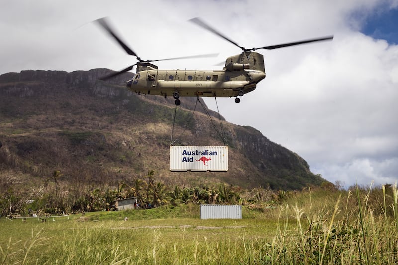 An Australian Army CH-47 Chinook helicopter delivers aid to Futuna Island in Vanuatu, March 21, 2023, following destructive cyclones.
